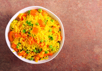 Rice with carrot, pepper and pea