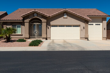 The facade of a residential house in a suburb area in the State of Nevada, USA.