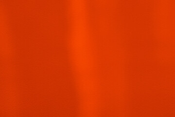 Red-Orange Concrete Wall with Light Beam on the Surface.