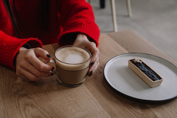 person drinking coffee
