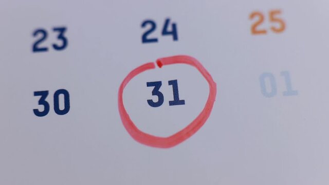red marker pen circling the date 31 on the calendar
