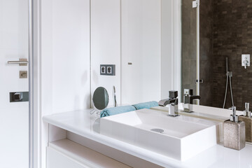 White ceramic vessel in the bathroom