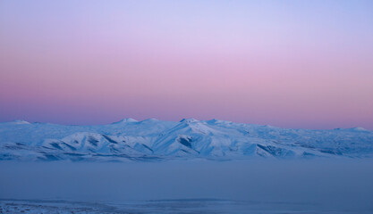 Fototapeta na wymiar snowy landscape with mountains