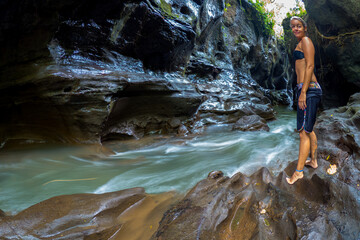 River flowing through jungle at  the Hidden Canyon Beji Guwang