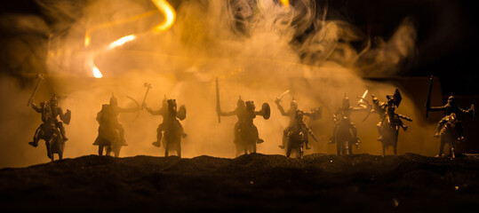 Medieval battle scene with cavalry and infantry. Silhouettes of figures as separate objects, fight...