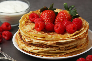 Russian cuisine national dish bliny with fresh berries