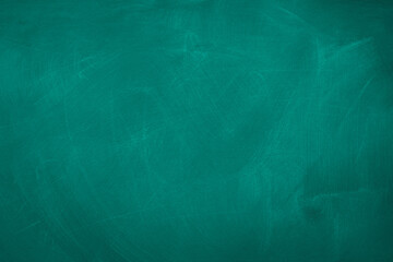 Texture of chalk on blank green blackboard or chalkboard background. School education, dark wall backdrop, template for learning board concept.