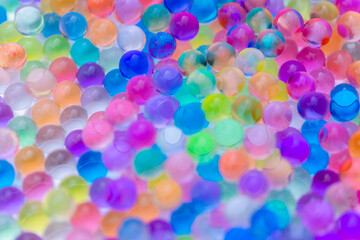 Colorful water beads or rainbow beads background.