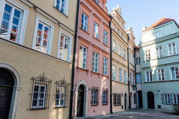 Fototapeta na wymiar Facades of colorful old Medieval houses in Stare Miasto (Warsaw Old Town), Warsaw, Poland - Europe