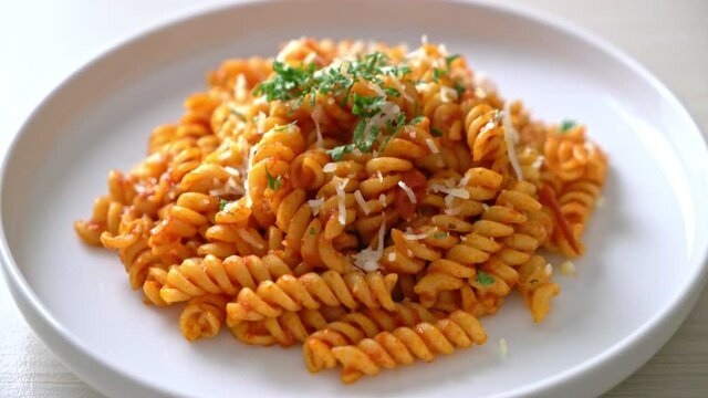 spiral or spirali pasta with tomato sauce and cheese - Italian food style