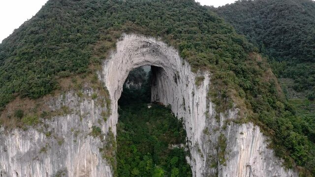 Beautiful natural Great Arch of Getu, Chinese karst mountain landscape, aerial