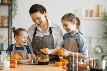 Happy family in the kitchen.