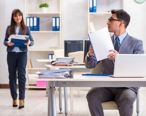 Man and woman working in the office