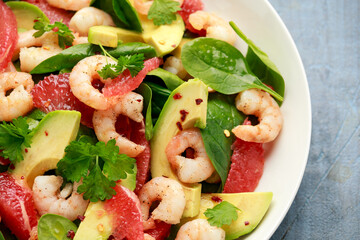 Fresh Avocado Grapefruit shrimp salad in white plate