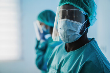 Men doctors at work inside hospital during coronavirus outbreak - Medical worker on Covid-19 crisis...