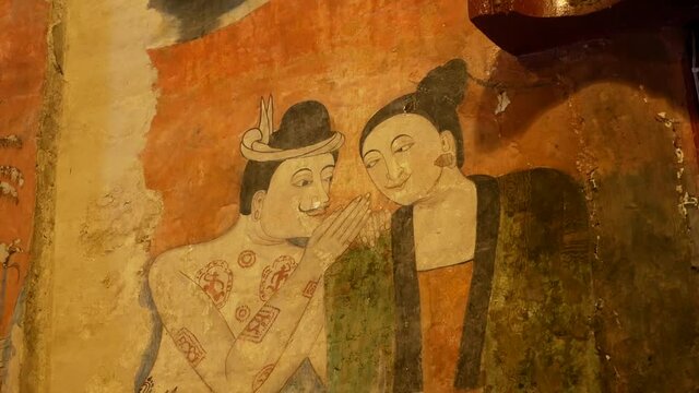Famous and Historic Art Wall Painting Of PuuManYaaMan In Wat Phumin, Nan Province, Thailand. Well-known as "Kra Sib Ruk Bun Lue Lok" Painting