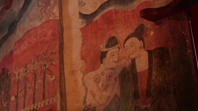 Famous and Historic Art Wall Painting Of PuuManYaaMan In Wat Phumin, Nan Province, Thailand. Well-known as "Kra Sib Ruk Bun Lue Lok" Painting
