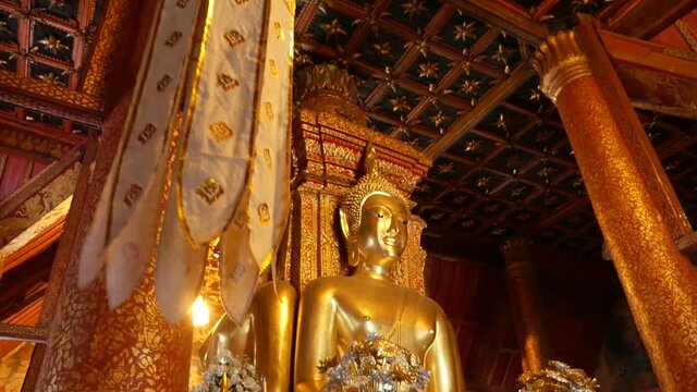 Big Golden Buddha Statue Located in Famous Wat Phumin Temple, Nan Province Thailand