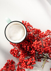 Coffee cup with candles on a white background for minimalism living