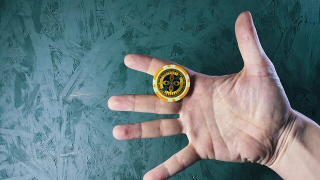 Hand Flipping And Showing Tricks With A Poker Chip, close up, stop motion