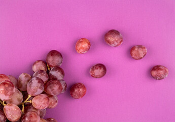 Bunch of grapes Red Globe on pink background
