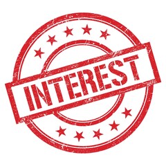 INTEREST text written on red vintage stamp.