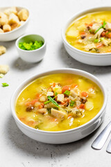 Comfort food, winter homemade split pea soup with smoked turkey. Space for text.
