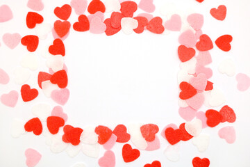 Red pink and white hearts on a white background. Valentine's day concept. Selective focus. Postcard. Background.