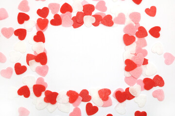 Red pink and white hearts on a white background. Valentine's day concept. Selective focus. Postcard. Background.