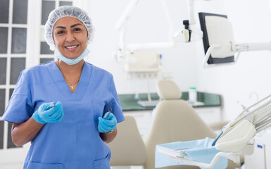 Portrait of dentist female in the workplace in clinic
