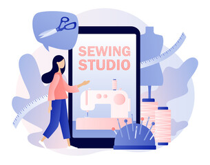 Sewing studio app concept. Tiny woman tailors with big smartphone in workshop or atelier. Sewing machine, mannequin, tools and materials. Modern flat cartoon style. Vector illustration