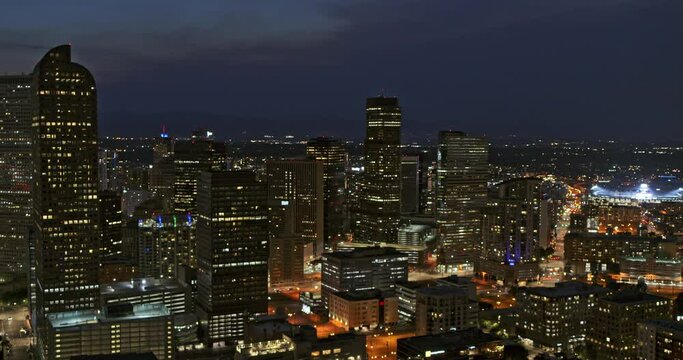 Denver Colorado Aerial v4 pan left shot of downtown cityscape at dusk night over North Capitol Hill area - DJI Inspire 2, X7, 6k - August 2020