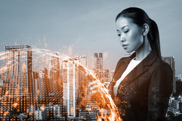 Attractive Asian HR director at international company is looking for highly qualified specialists to recruit by using smartphone. Social media hologram icons over Bangkok.