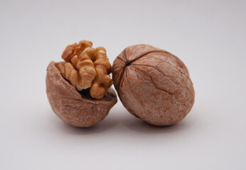 Delicious whole walnuts, isolated on white background