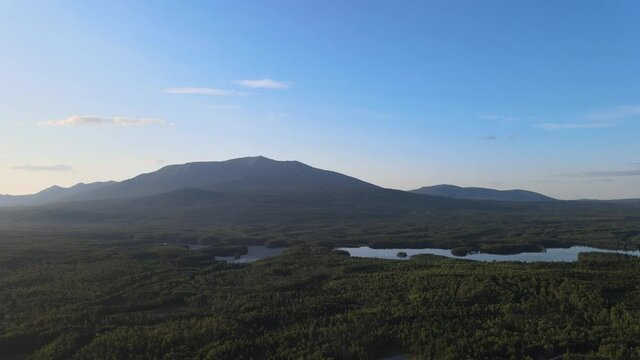 Panning aerial view of mountains, lakes and forrest at Baxter State Park