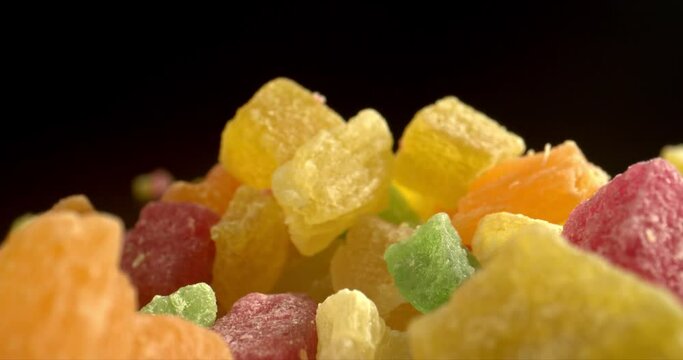 A mix of dried fruits. A lot of different healthy food. Dried apples, mango, feijoa, dried apricots, prunes. Colorful Sweet Candy Delicious Concept. Vegetarian food. High quality.