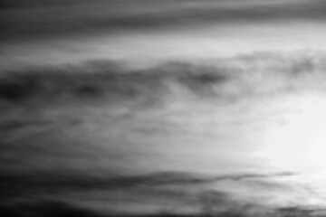 Monochrome cloud image forming abstract pattern with negative space