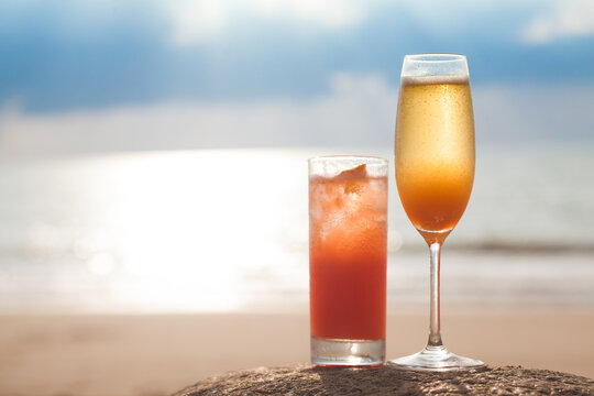 exotic coctails over sunset beach background. Thailand