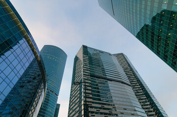 Fototapeta na wymiar Skyscrapers in Moscow, bottom view, glass and concrete