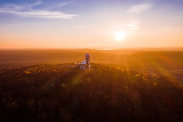 sunset behind teufelsberg with former surveillance station of usa