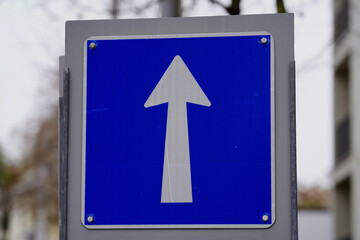 Traffic sign one way close up.