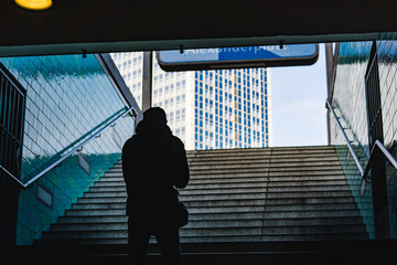 person going up the stairs from the subway station in berlin © DEN