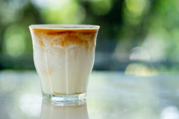 Name is Dirty Iced. Iced milk at the bottom of the glass and shot espresso on top