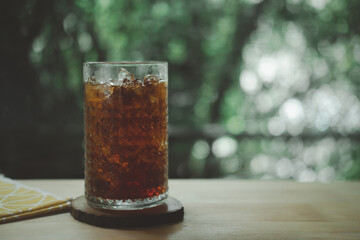 Soft drink in glass on the wood table