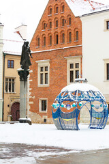 Snowy winter in Krakow, Saint Mary Magdalene Square and monument to Piotr Skarga, Christmas decoration, Krakow, Poland