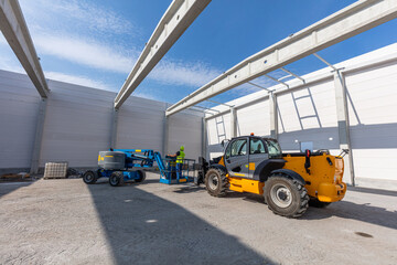 Warehouse construction with industrial vehicles.