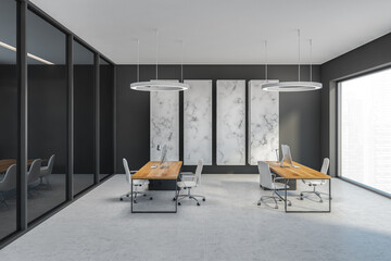 Grey office room with chairs and computer on wooden tables, tiled floor