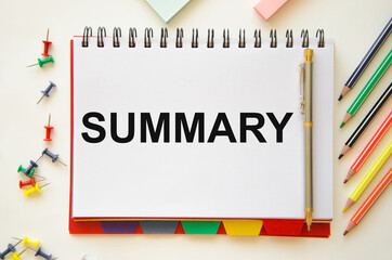 a summary of the word written on a white notepad that lies on a white background