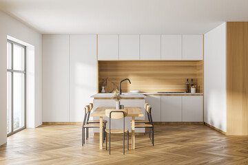 White and wooden kitchen interior with table