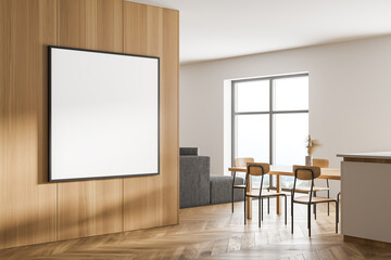 White and wooden kitchen corner with island and poster
